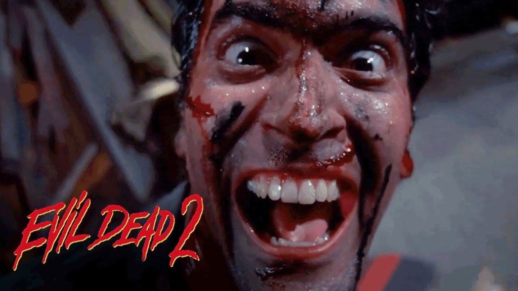 Bruce Campbell as Evil Dead 2's Ashley "Ash" Williams, mid-laugh from the infamous laughter scene. The film's title can be seen in the lower left.